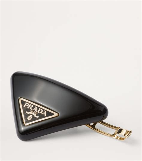 prada plexiglas hair clip|Prada triangle.